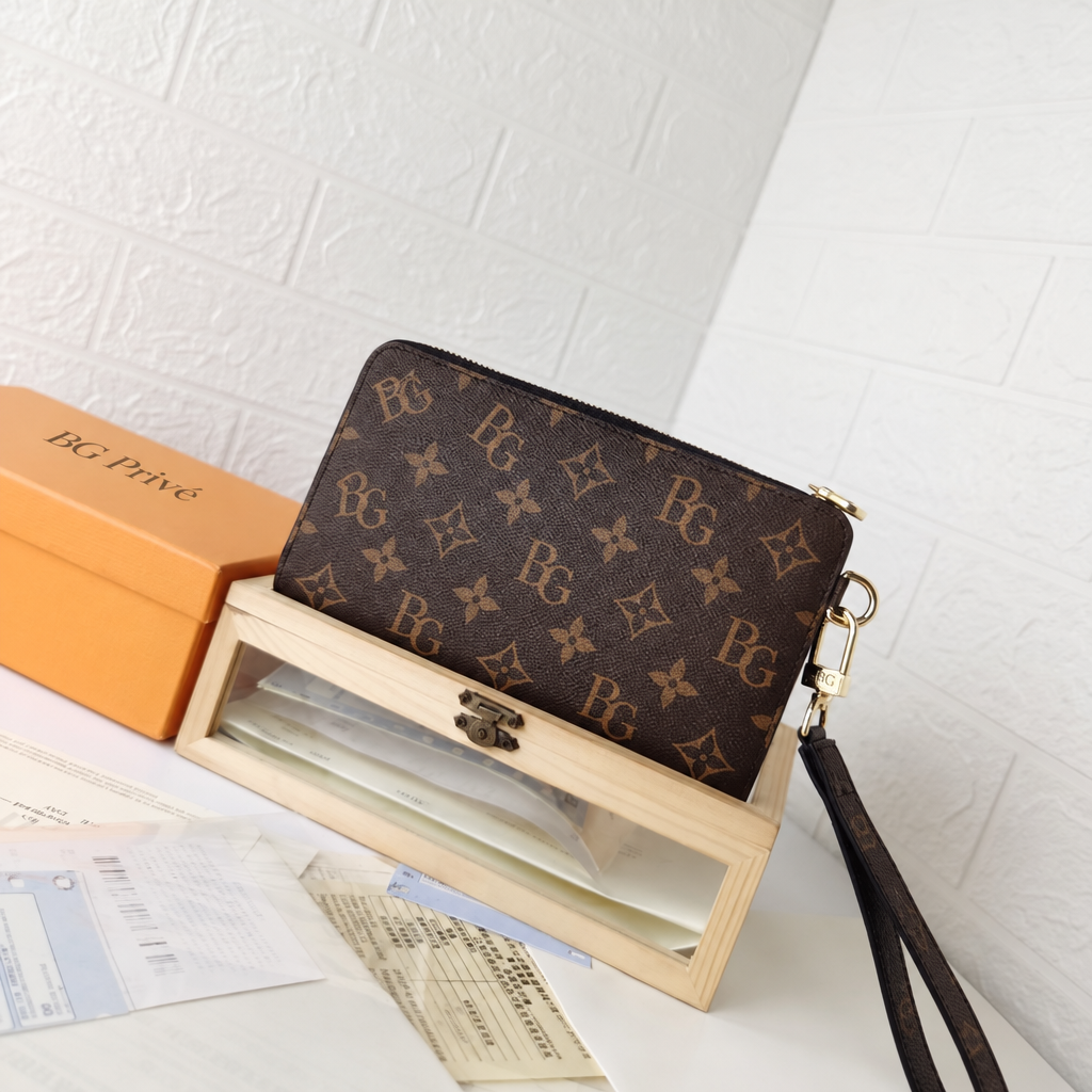 Zippy Dragonne Wallet in Monogram Macassar