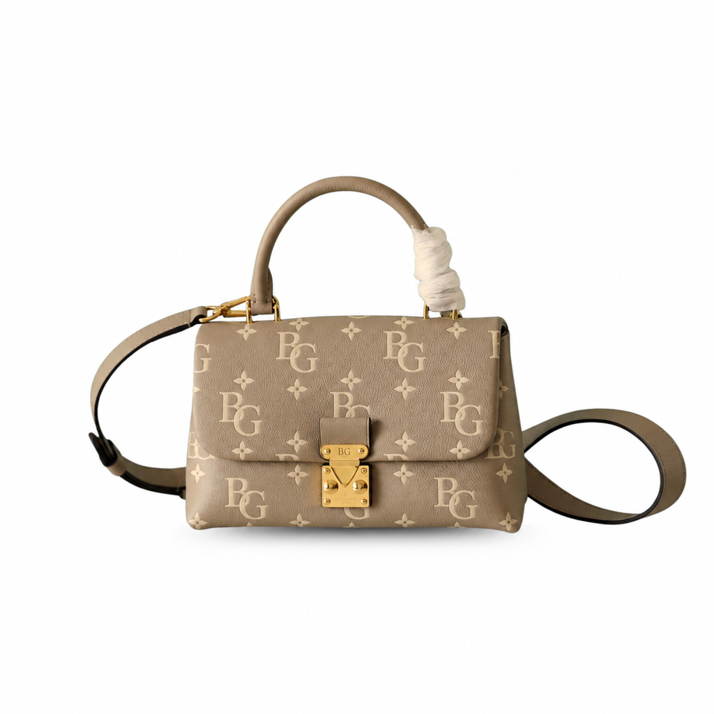 Madeleine BB Bicolor Monogram Empreinte Leather Handbag