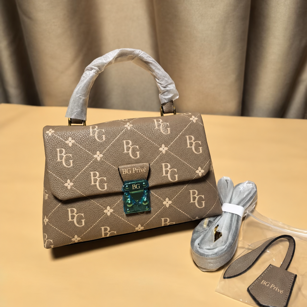 Madeleine BB Bicolor Monogram Empreinte Leather Handbag