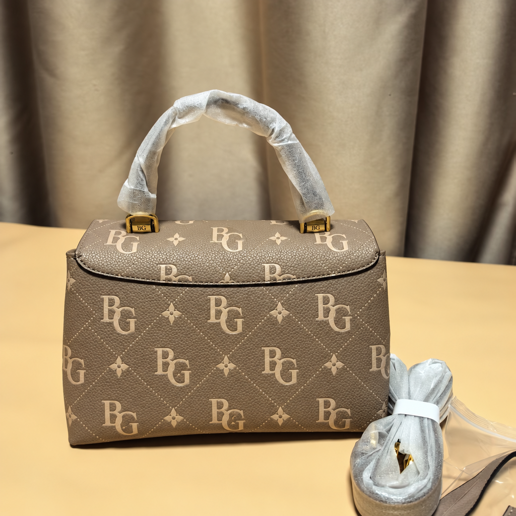Madeleine BB Bicolor Monogram Empreinte Leather Handbag