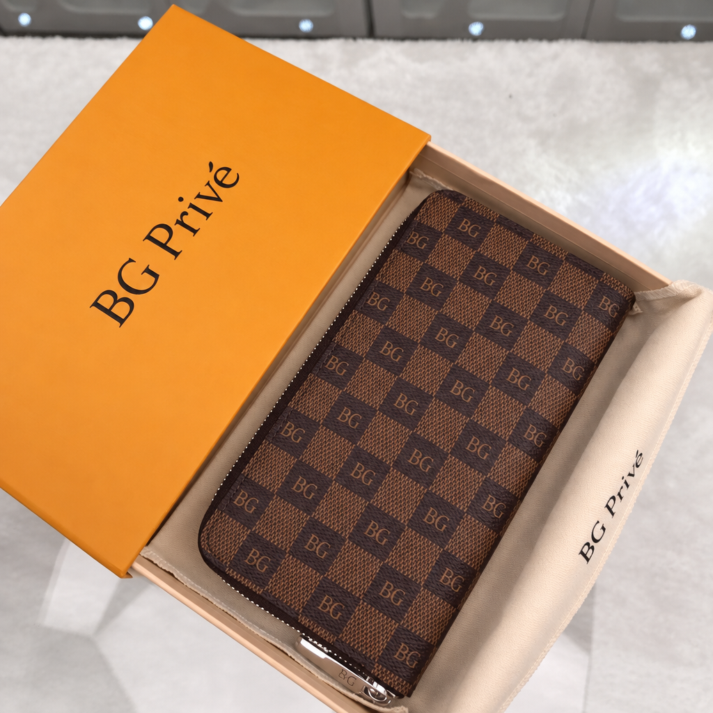 Zippy Wallet Vertical in Damier Ebene Canvas