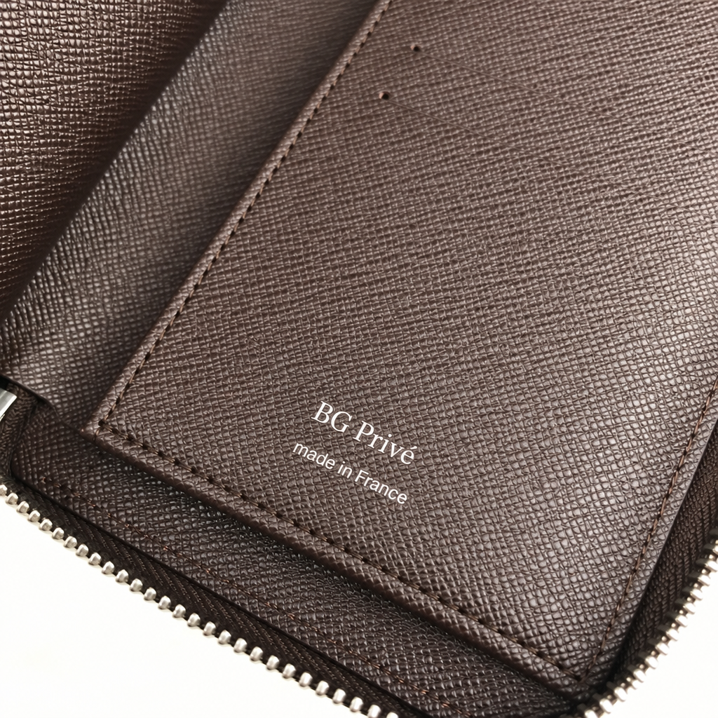 Zippy Wallet Vertical in Damier Ebene Canvas