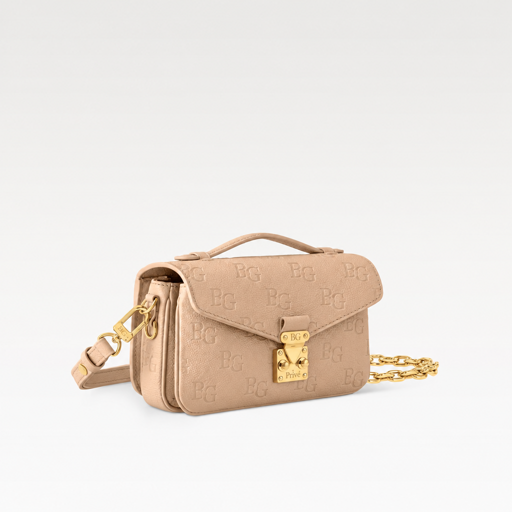 Pochette Métis East West in Sand Monogram Empreinte Leather