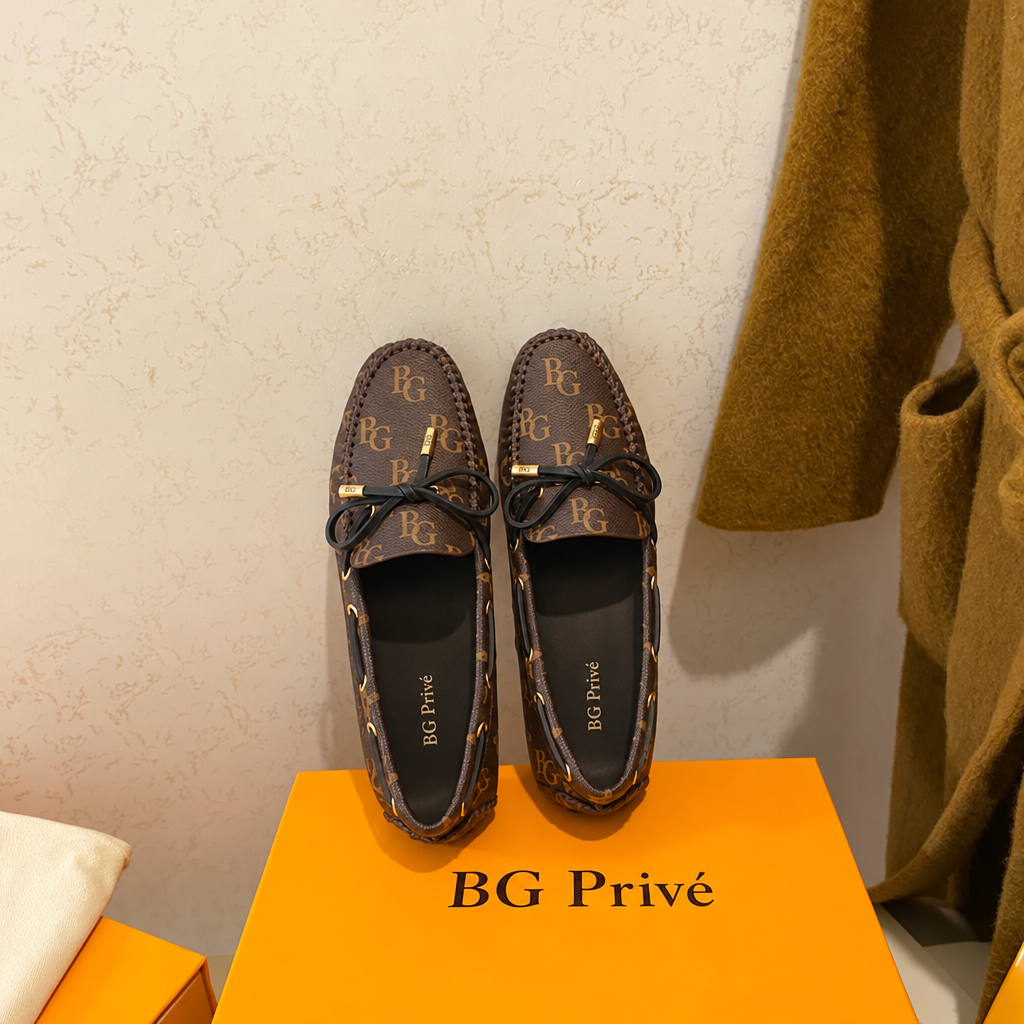 Gloria Flat Loafer in Brown Monogram Canvas
