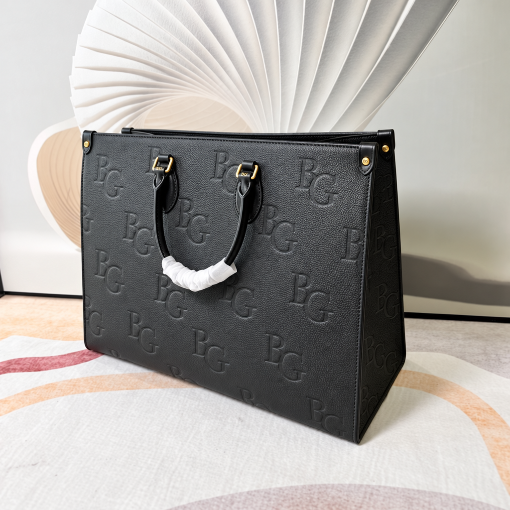 OnTheGo GM Black Monogram Empreinte Leather Tote