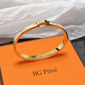 Clic H Bracelet – White Enamel and Yellow Gold-Plated Metal