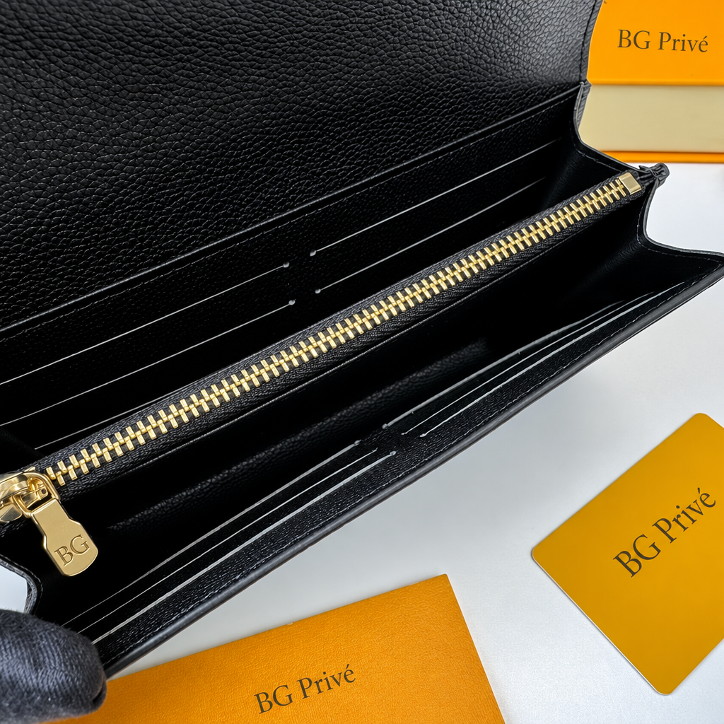 Sarah Wallet in Bicolor Monogram Empreinte Leather M80496