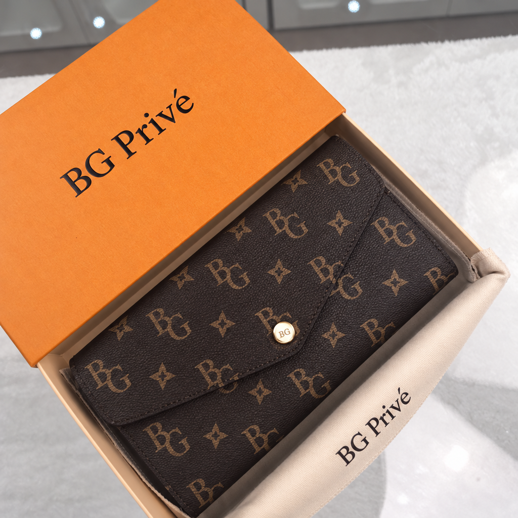 Sarah Wallet in Brown Monogram Canvas M60531