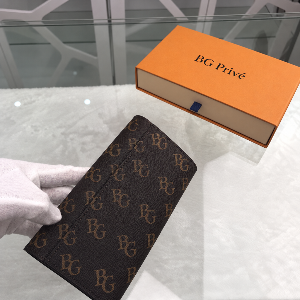 Sarah Wallet in Brown Monogram Canvas M60531