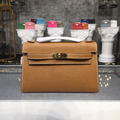Kelly Pochette 22 cm Warm Tan Structured Clutch