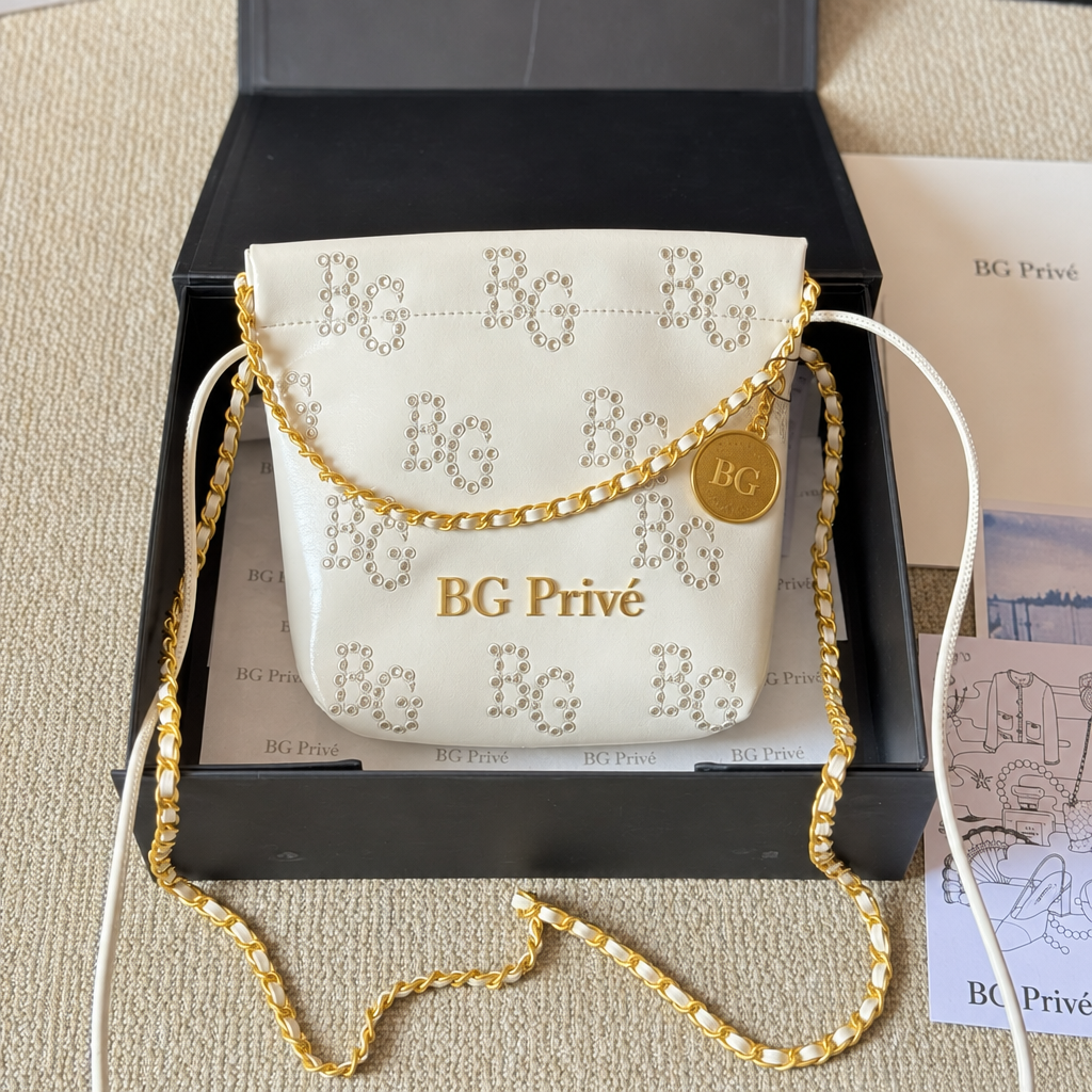 22 Mini Handbag with Eyelet Embroidery - White