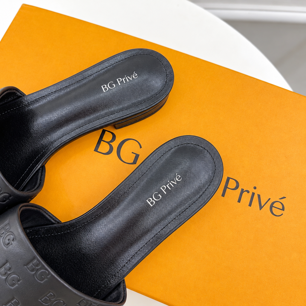 Revival Flat Mule in Black Monogram Lambskin