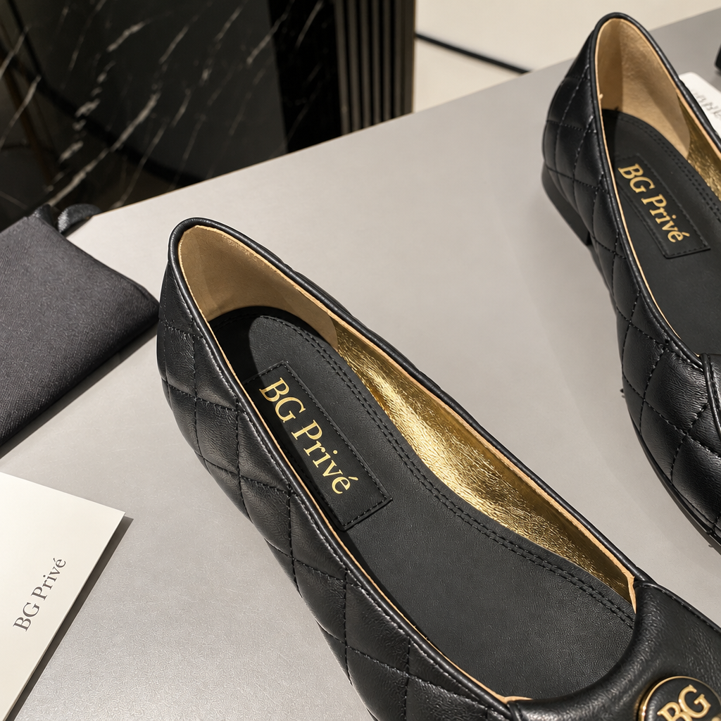 Black Quilted Leather Ballet Flats with Gold Medallions