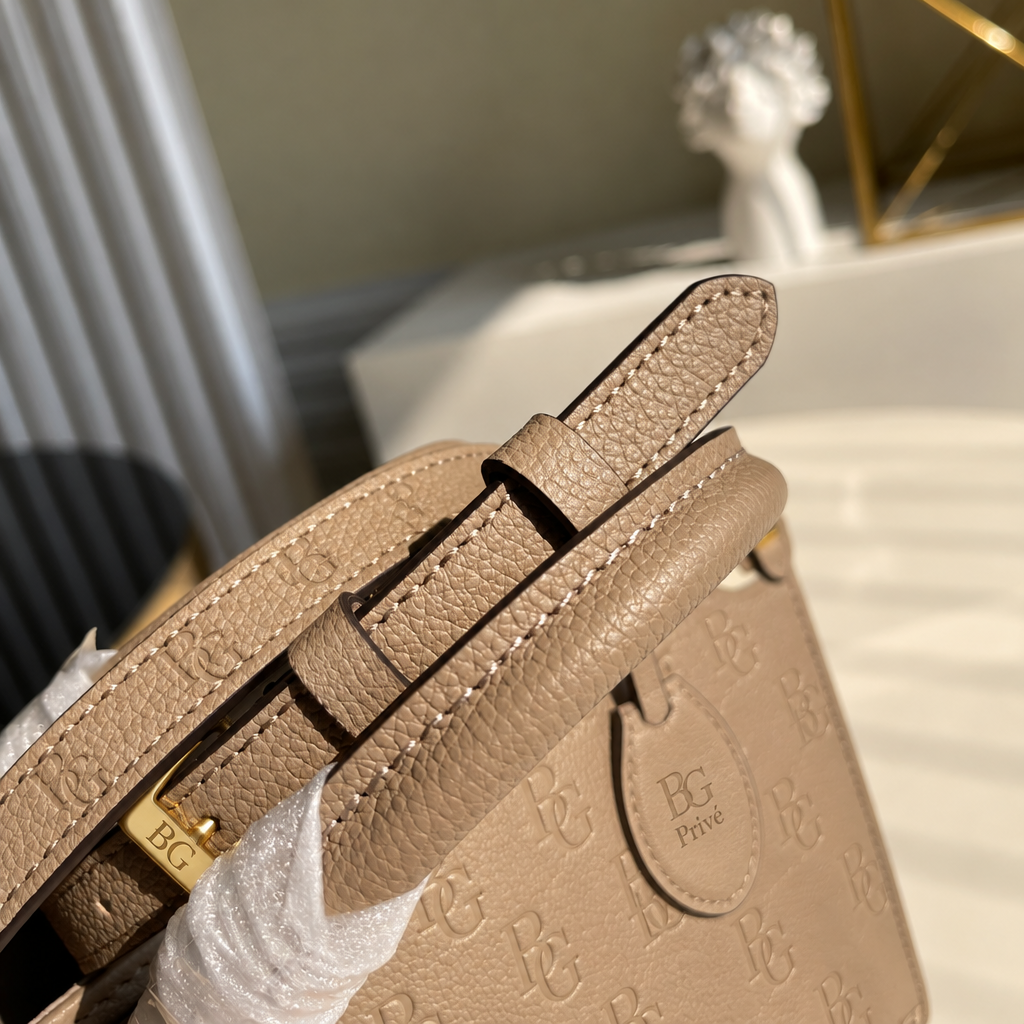 OnTheGo PM Bicolor Monogram Empreinte Leather Tote
